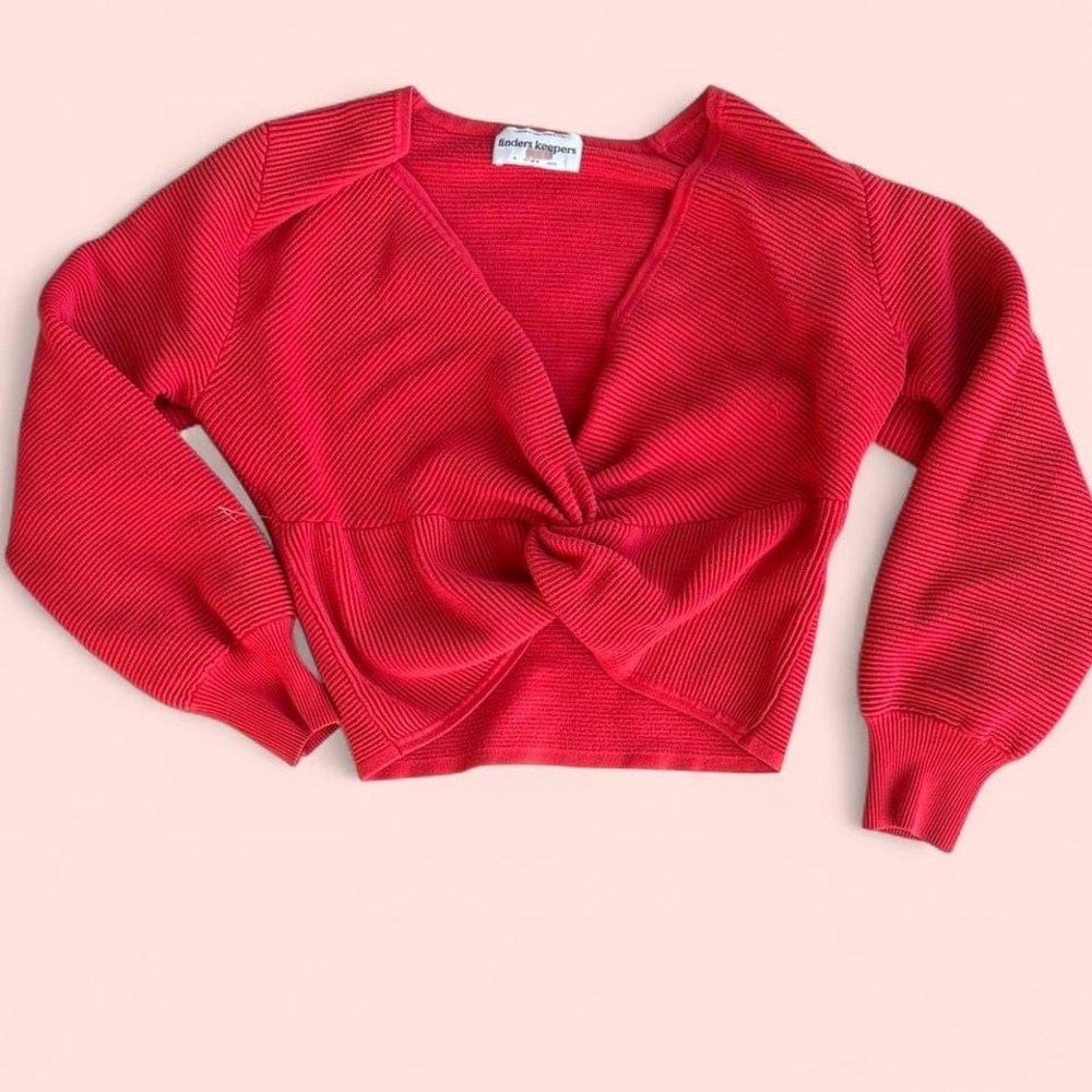 Red‎ knit sweater with knit-esque design